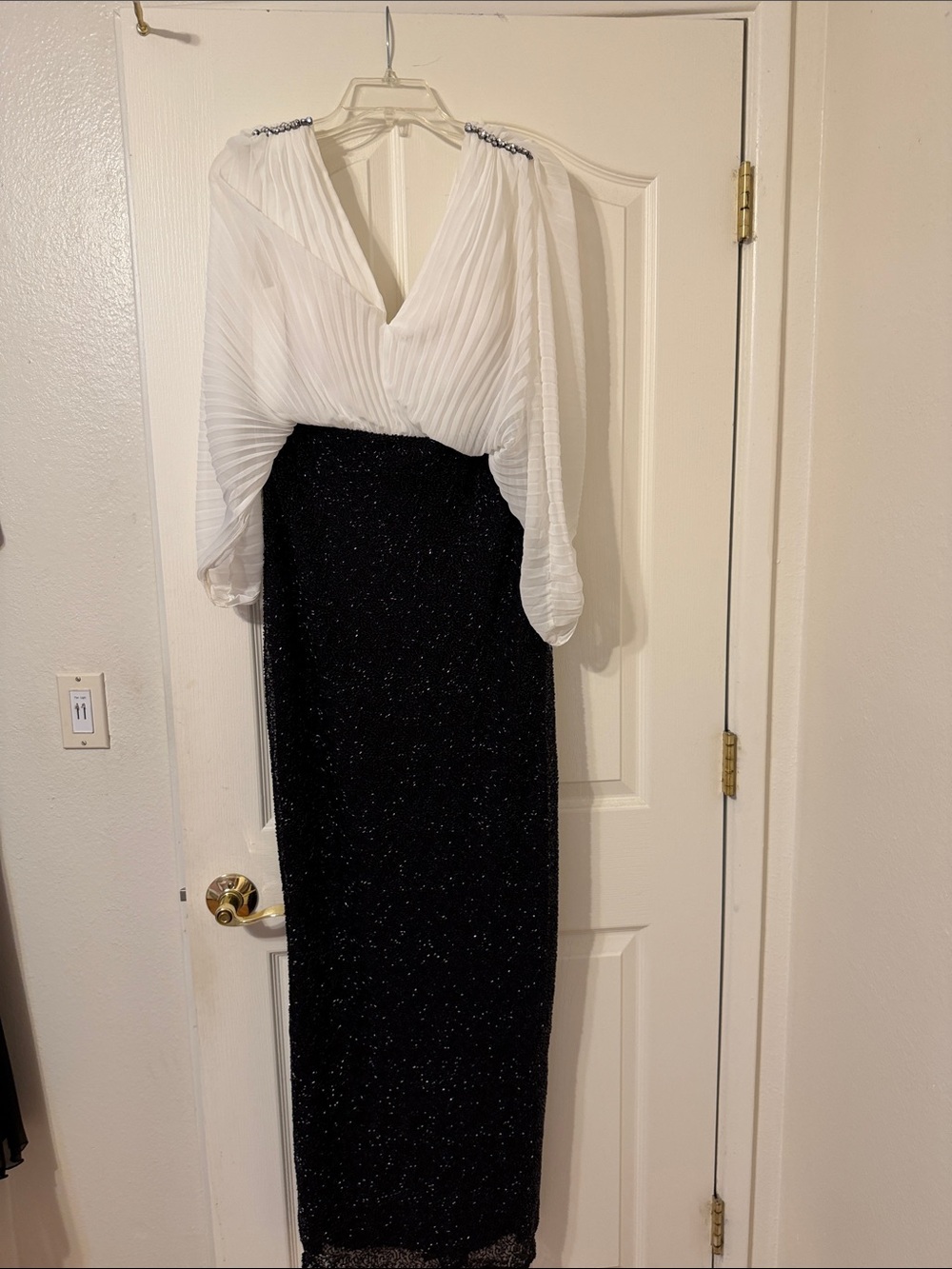 Elegant Black Sparkle Maxi Skirt with White Blouse Styling